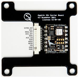 Aspirin IMU on flat carrier with documented IO connections.